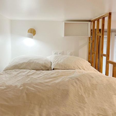 Appartamento Charme Cosy Au Coeur De Parigi Esterno foto