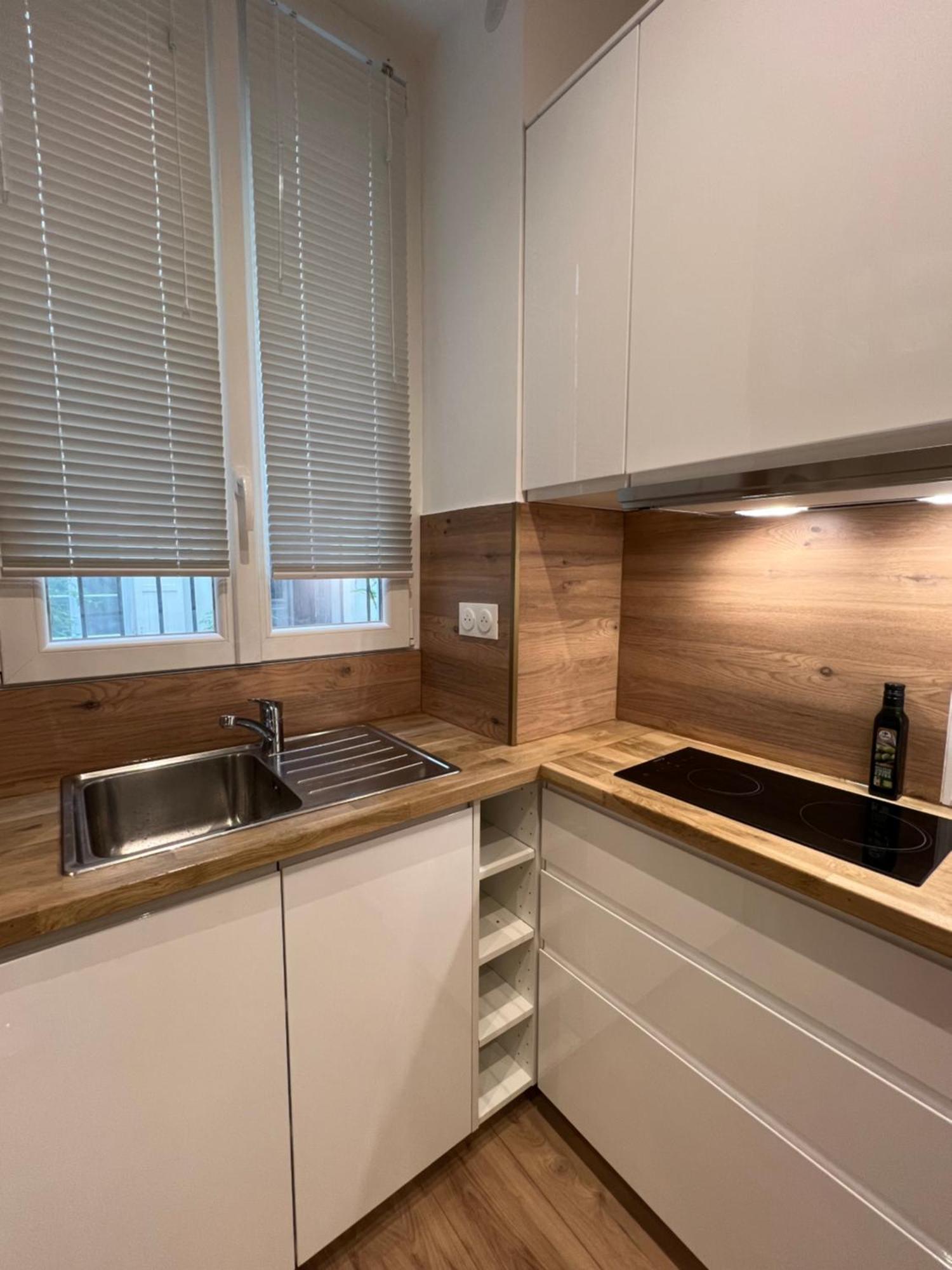 Appartamento Charme Cosy Au Coeur De Parigi Esterno foto